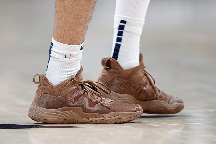 View of Jamal Murray's brown New Balance shoes.